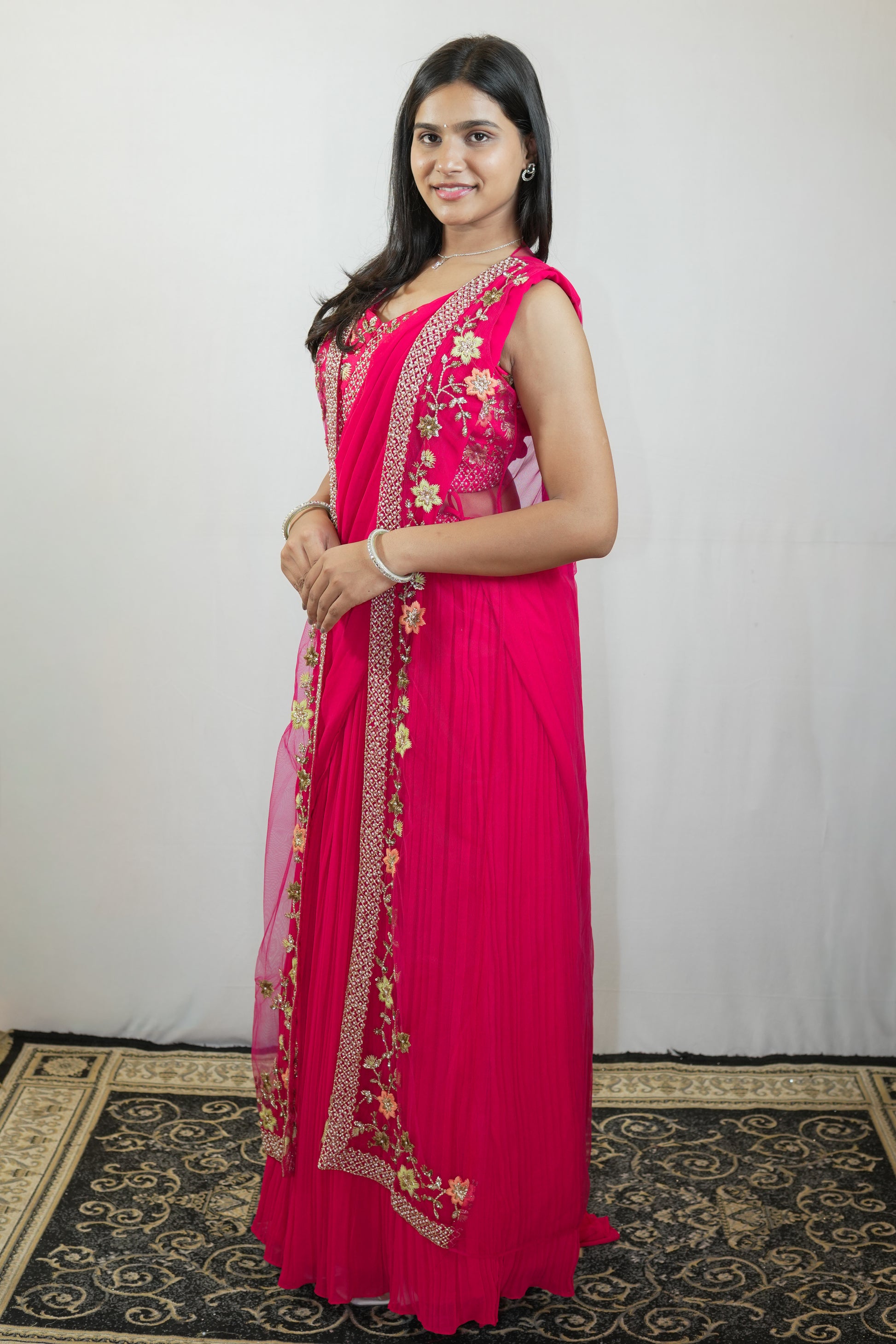 Roselle floral embroidered overlay detail in rani pink full side